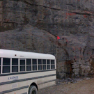 Vertical lines in the rock face show the density of the drilling grid used in the excavation of the powerhouse.    