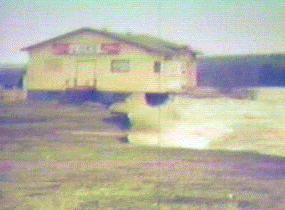 Image of house collapsing in Bishop's Falls, January 1983