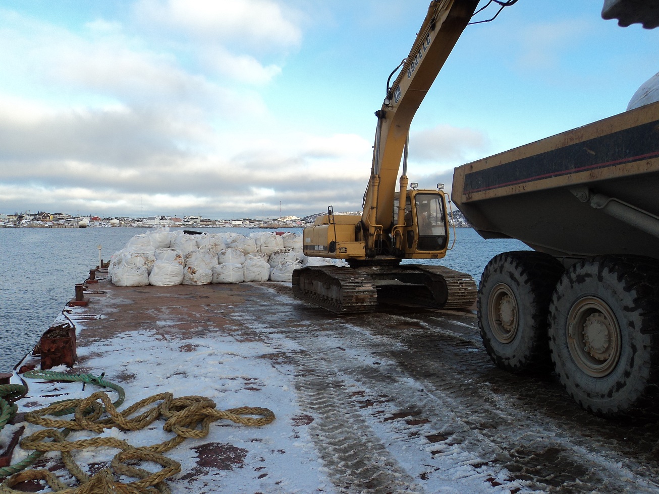 PCB-impacted soil being loaded onto barge in 2012