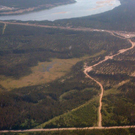 Aerial photograph of the Muskrat Falls site. Lower falls are at the wing tip.  The hill to the right of the falls is known as the Rock Knoll. 