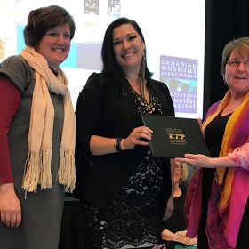 Dr. Heather Igloliorte, guest curator and author; and Kate Wolforth, Manager of Collections, The Rooms, accept the Canadian Museums Association Award of Outstanding Achievement in Education for the exhibition catalogue SakKijâjuk: Art and Craft from Nunatsiavut from Jane Fullerton Vice President of the Canadian Museums Association at the CMA’s Award Ceremony in Vancouver yesterday evening.