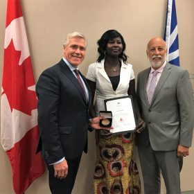 The Honourable Dwight Ball, Premier of Newfoundland and Labrador, the Honourable Al Hawkins, Minister of Advanced Education, Skills and Labour, and Council of the Federation Literacy Award recipient, Ms. Suna Dau Yath.