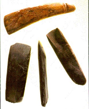 Woodworking tools from the MAI cemetery; note gouge on far right.